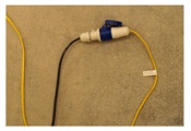 Extension cord with a portable socket 